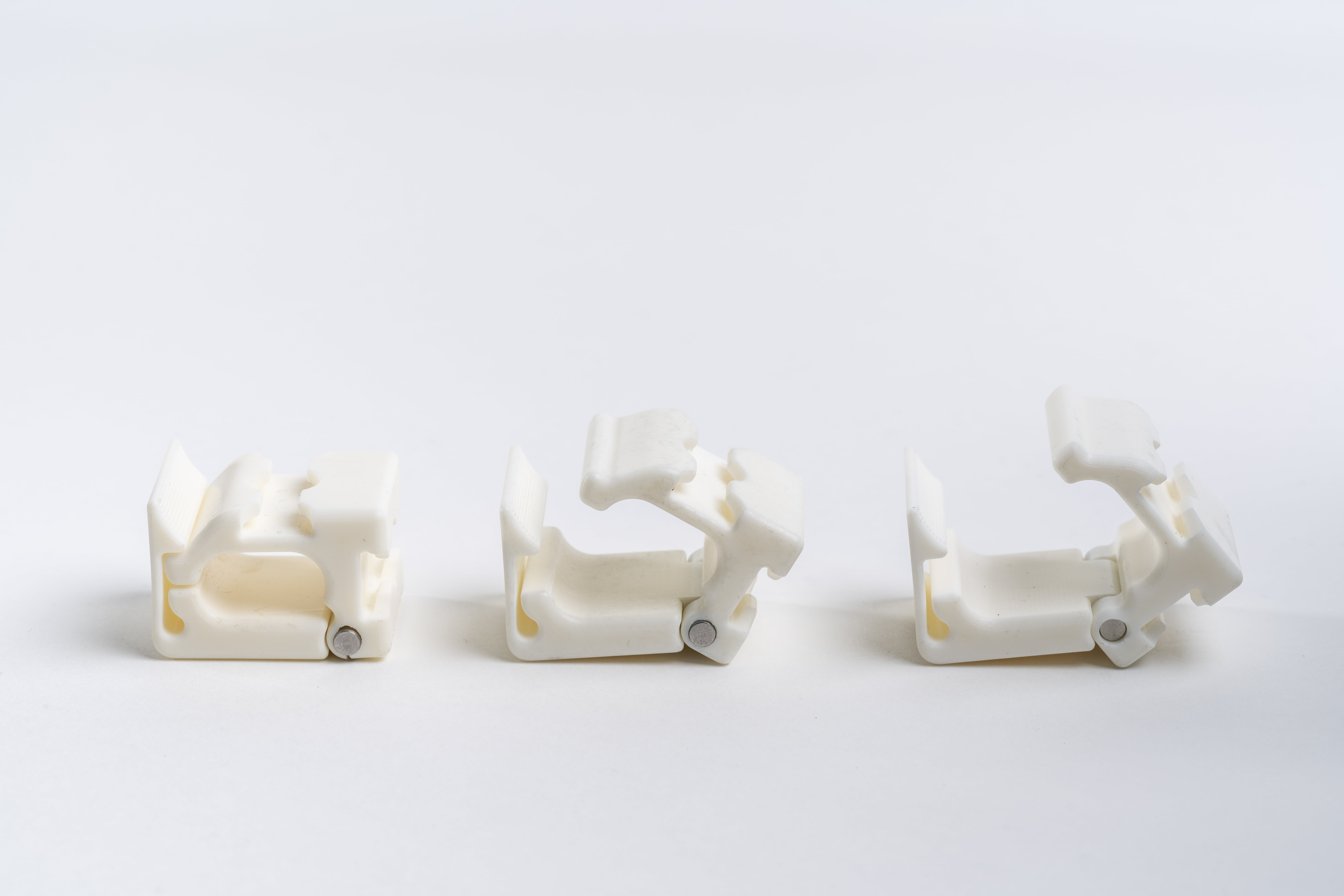 White 3D printed prototype clips