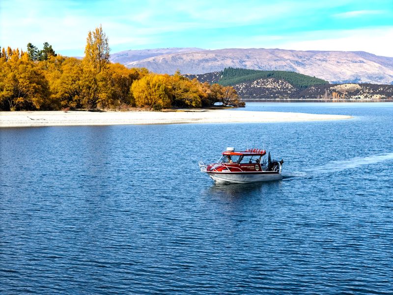 Drone view of Lake Wānaka and the Southern Alps