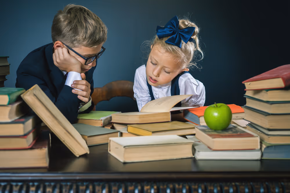 Kids reading lot of books.