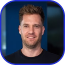 a man smiling for a picture