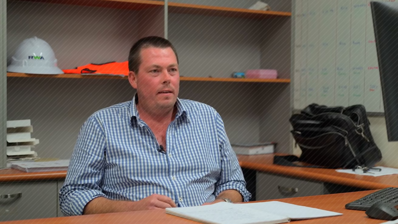 a man sitting at a desk