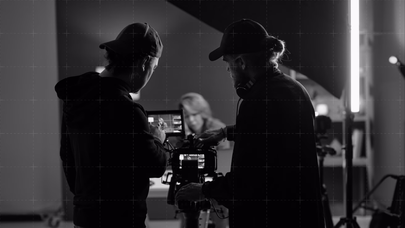2 filmmakers filming an interview