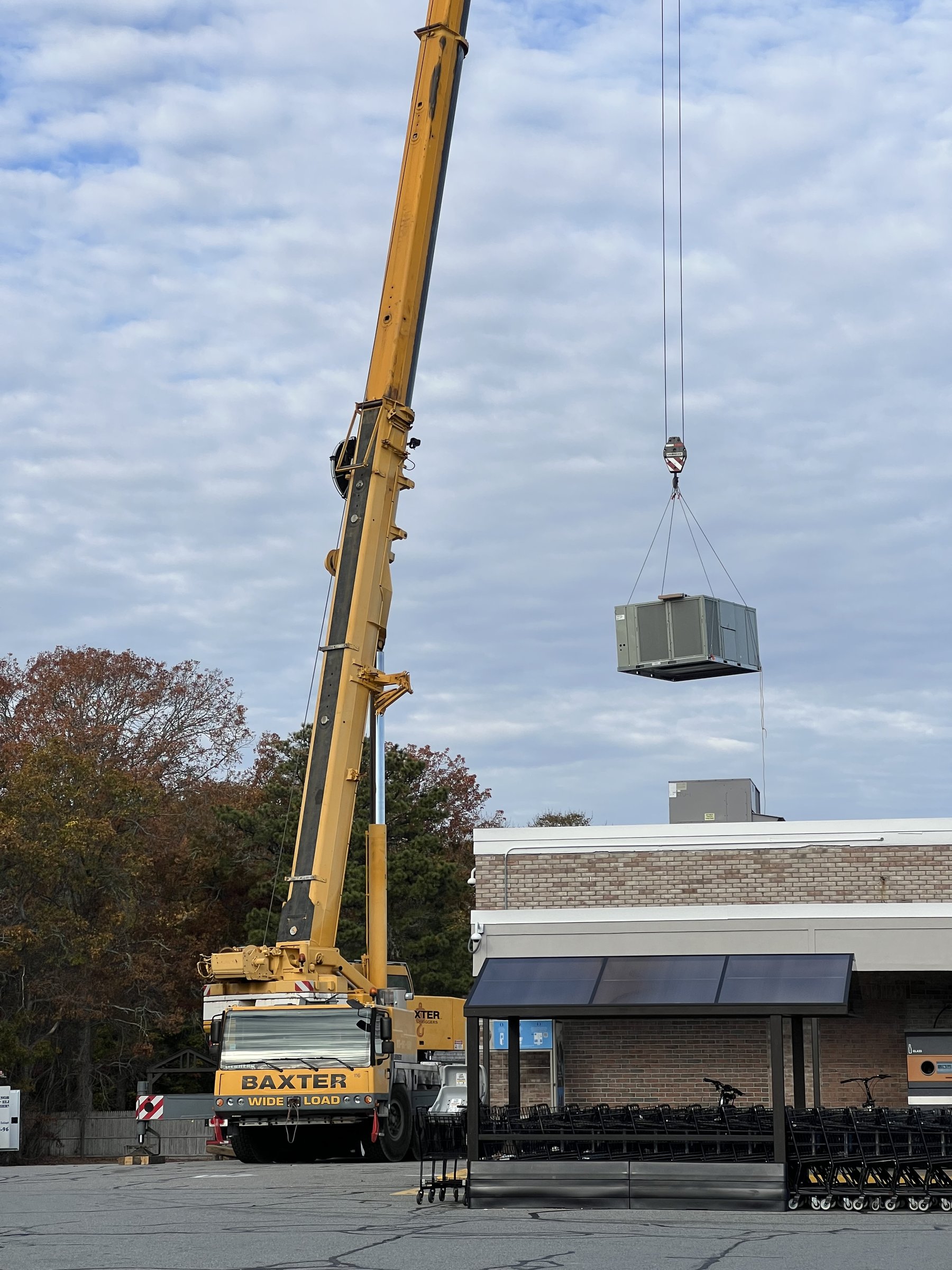 Baxter Crane lifting rooftop HVAC unit