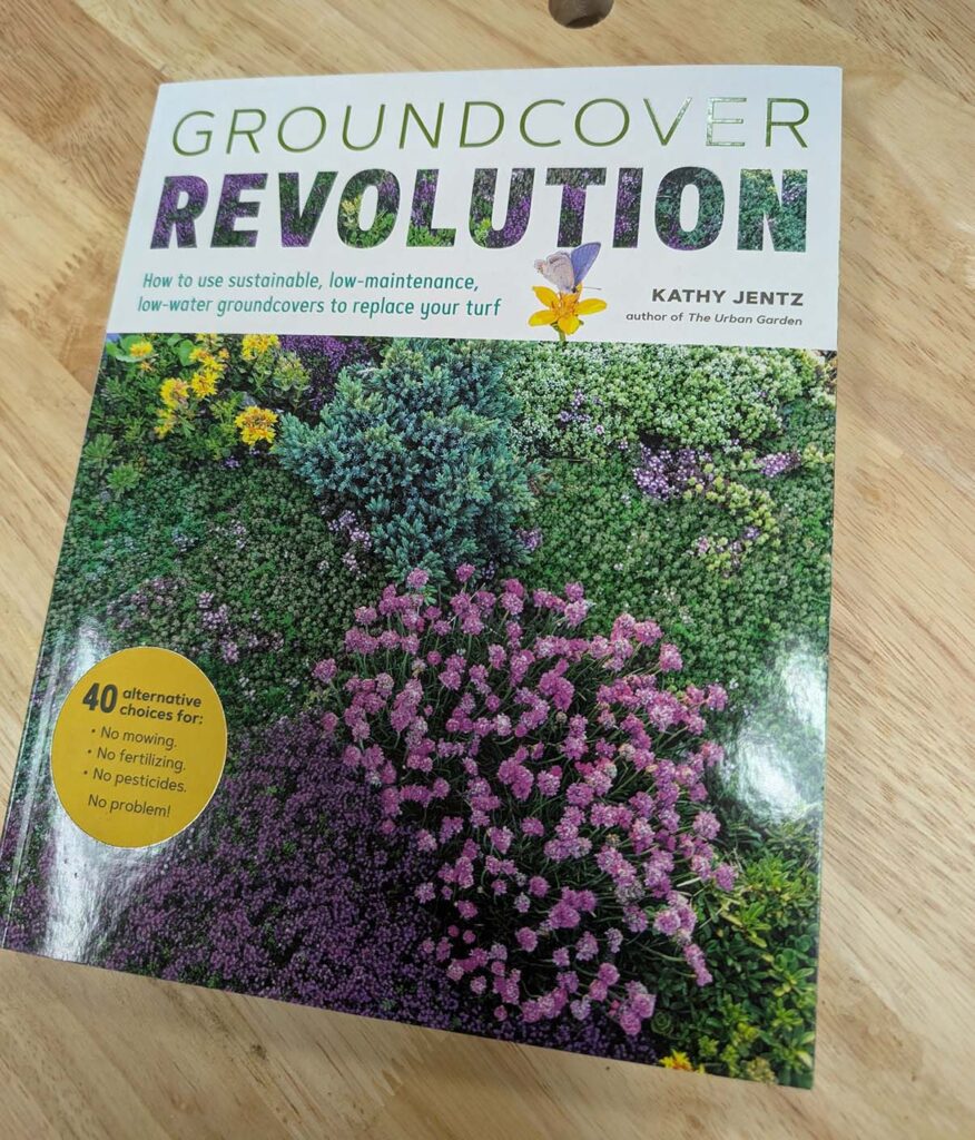 Groundcover Revolution book on wood bench