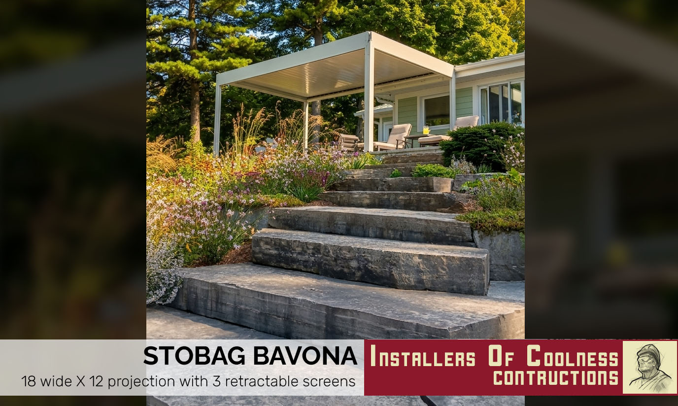 Black metal awning above a door on a brick building wall.