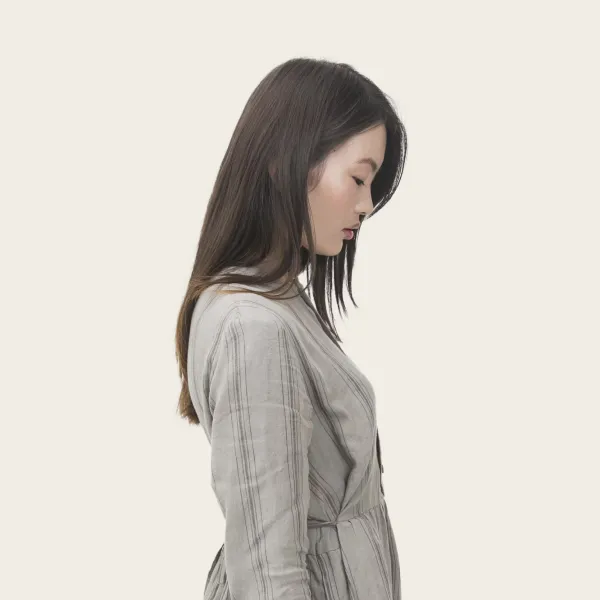 A side image of a woman