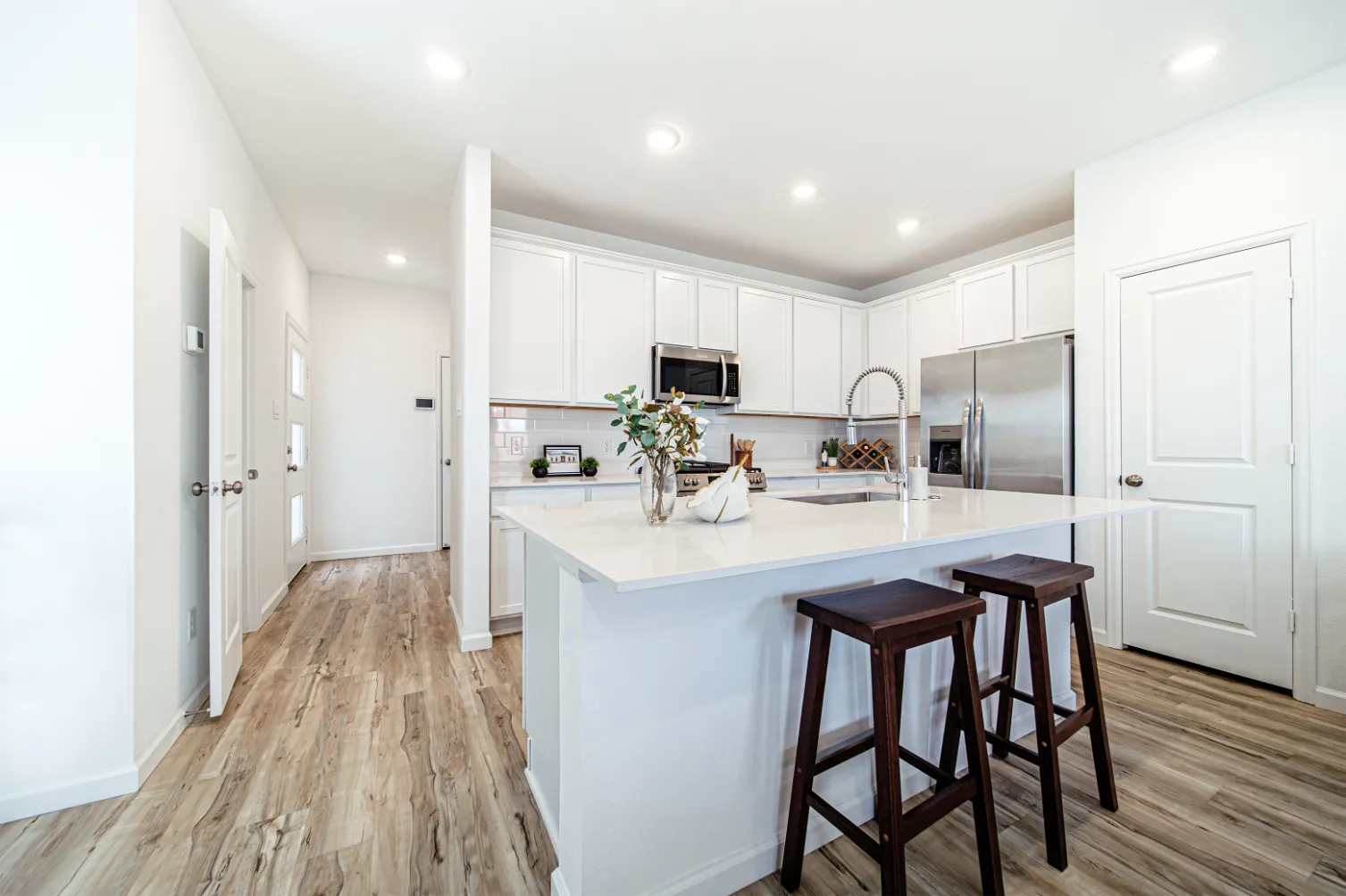 kitchen with island with chairs