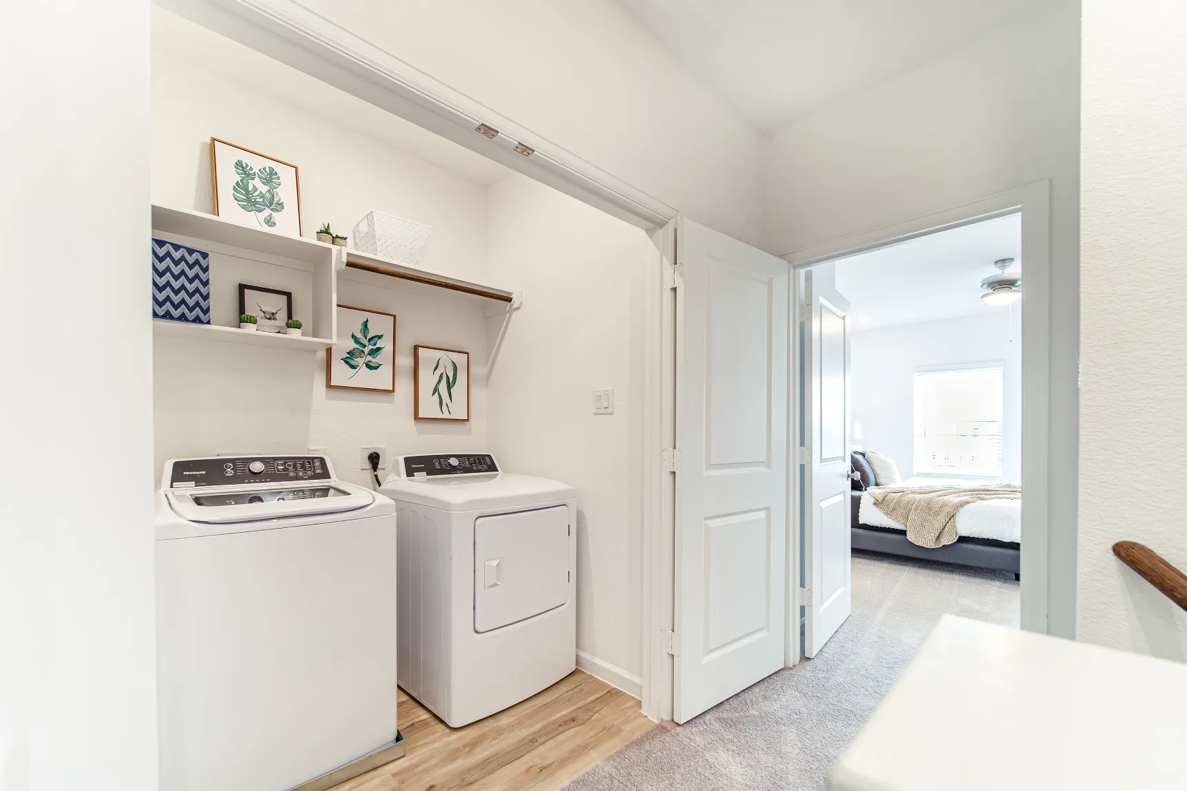 Laundry Room with white appliances
