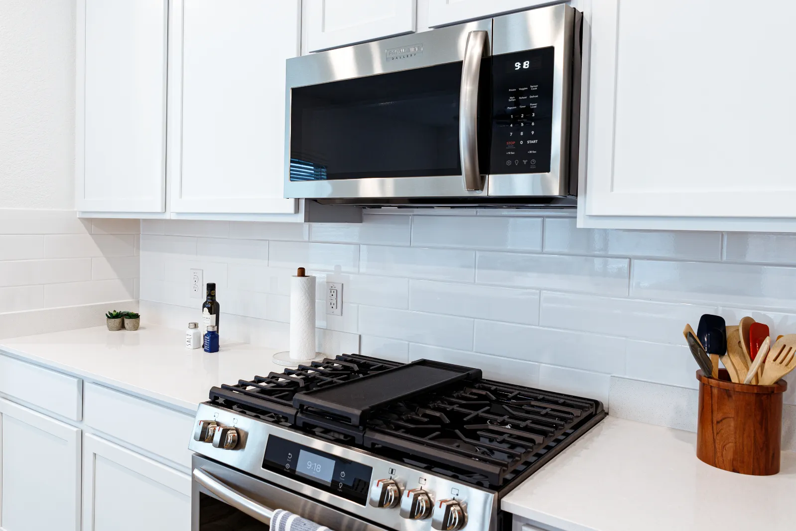 Stainless steel gas range and microwave