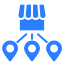 Icon showing a storefront connected by a line to a location pin and a gear symbol, representing franchise and business setup.