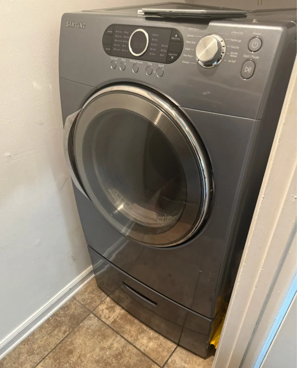 Samsung front load dryer in laundry room
