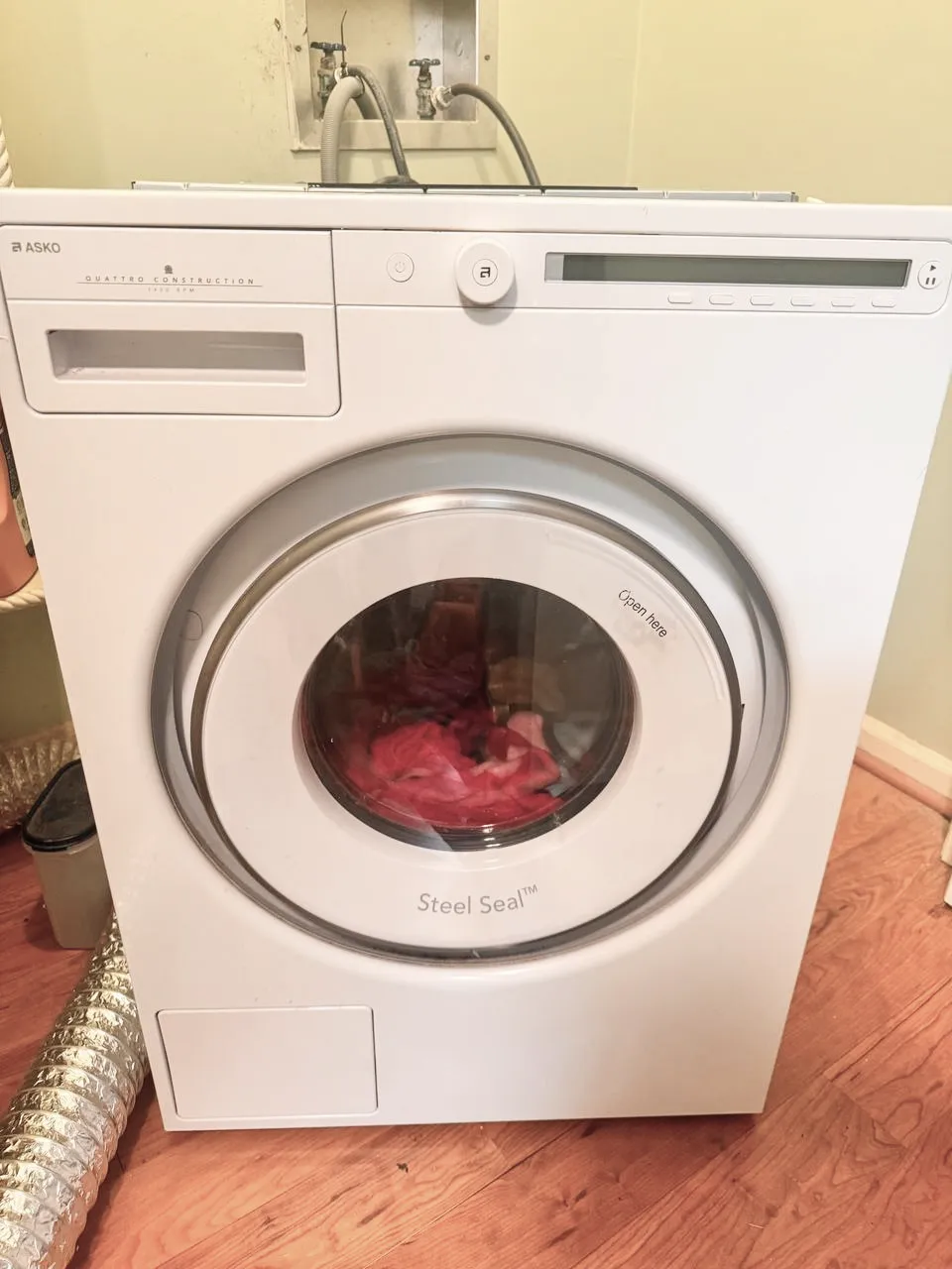 ASKO front load washer with laundry inside