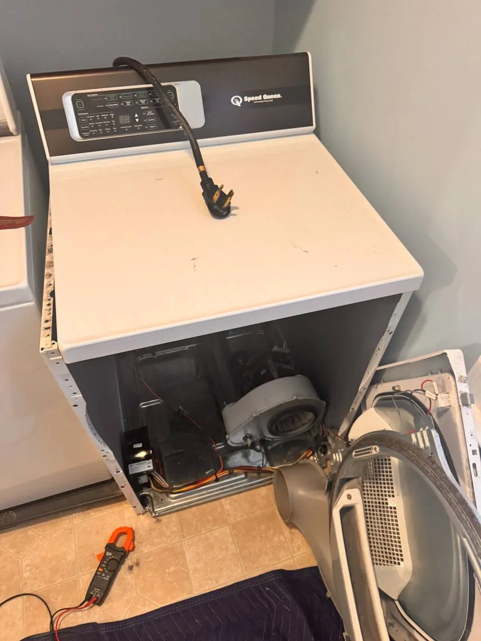 Speed Queen dryer repair with front panel removed for diagnostic