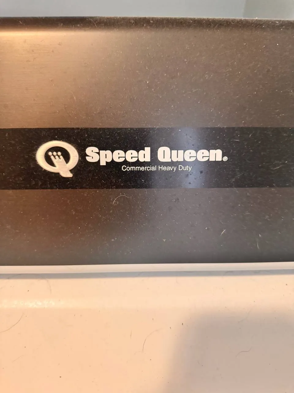 Speed Queen commercial heavy duty appliance logo close up