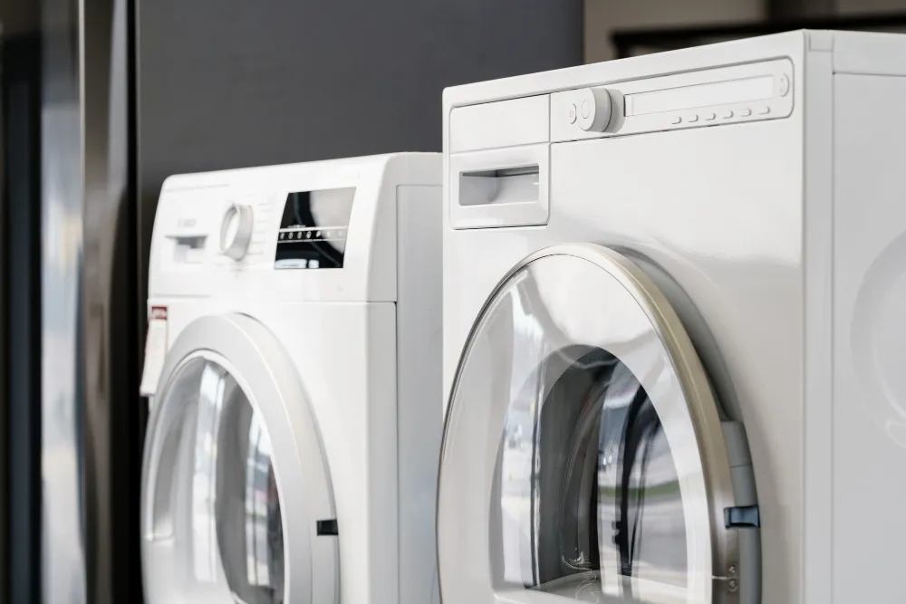 Amana washer and dryer set in laundry room