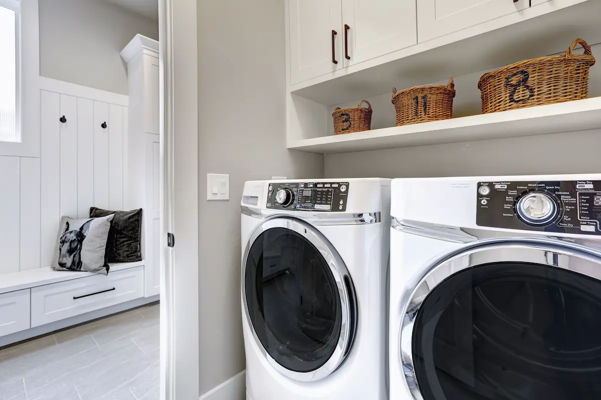Modern laundry room with front load washer and dryer
