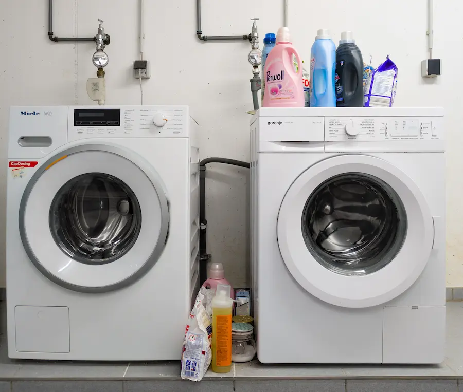 Miele front load washer and dryer set in laundry room