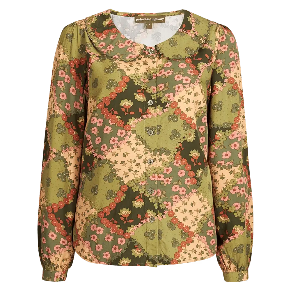 Ghost mannequin product photography of a autumn themed womens blouse