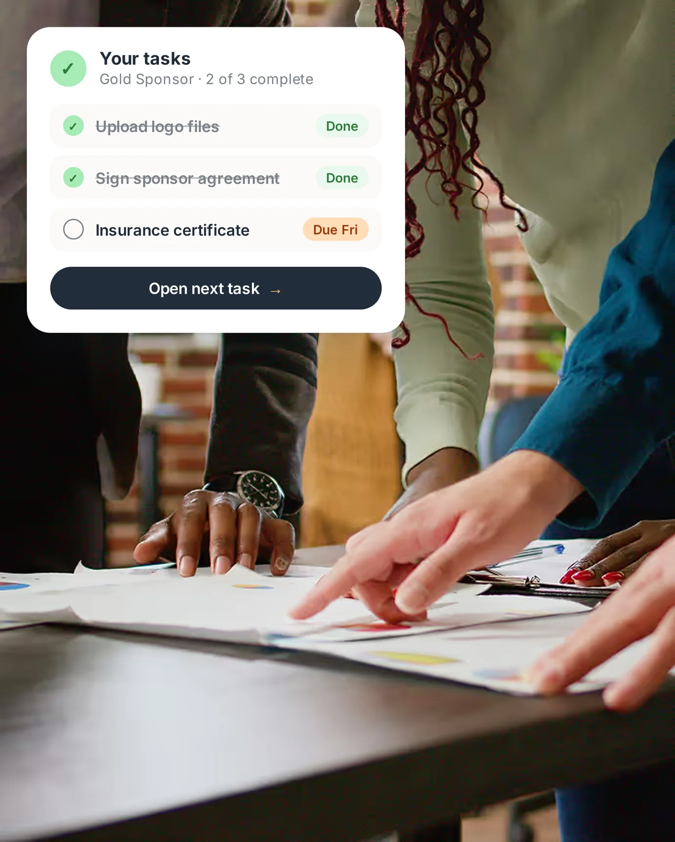 Team pointing at event plans, with a PartnerHQ sponsor task list showing logo and agreement done and an insurance certificate due Friday.