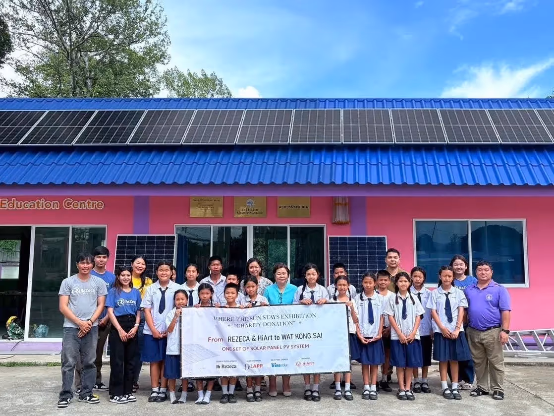 Rezeca team installing solar panels on a rural school roof in Chiangmai, Thailand