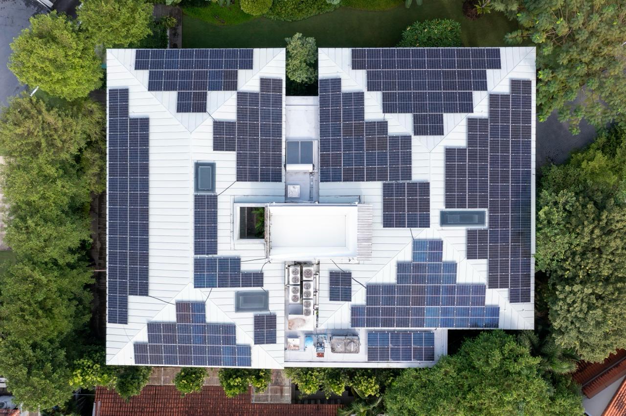 210 Trina Solar panels installed on the metal roof of a Good Class Bungalow in Cluny Hill, Singapore — 89.25 kWp solar system by Rezeca Renewables