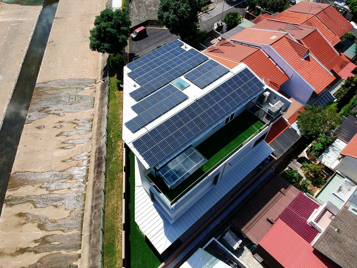 Rezeca Renewables 29.50 kWp solar panel installation on a metal roof at a contemporary landed home on Jalan Pari Burong, Bedok, Singapore