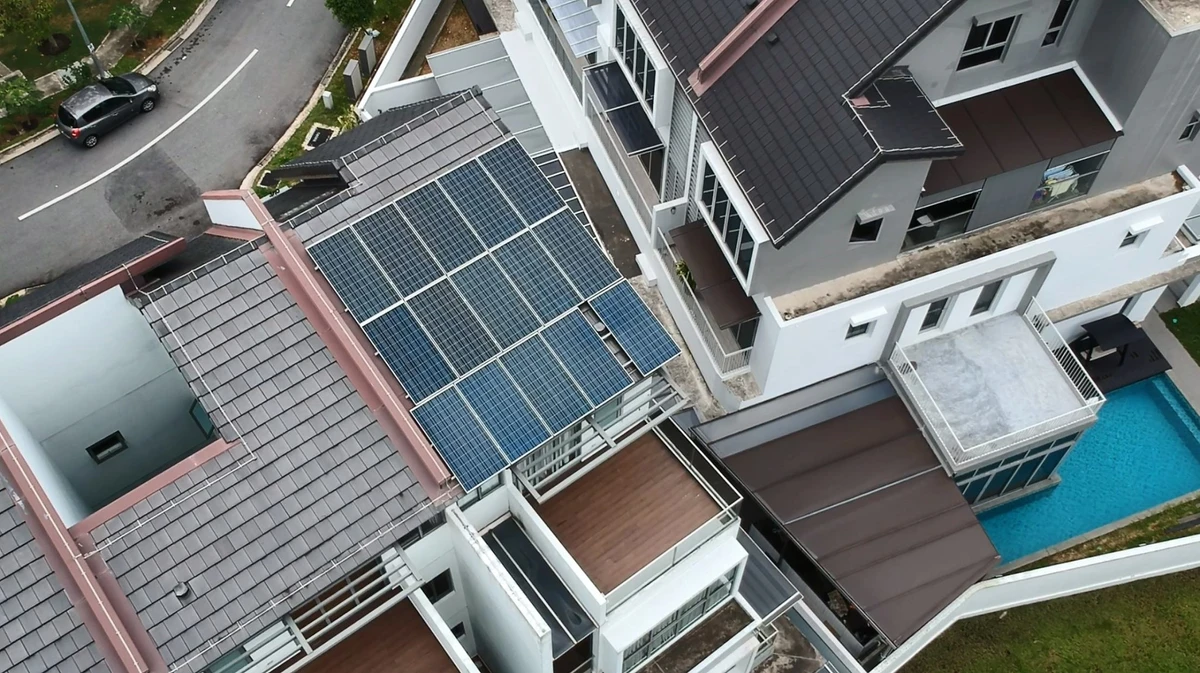 Rezeca Renewables 11.57 kWp solar panel installation on a dark tile roof at a Springside Crescent terrace home, Upper Thomson, Singapore
