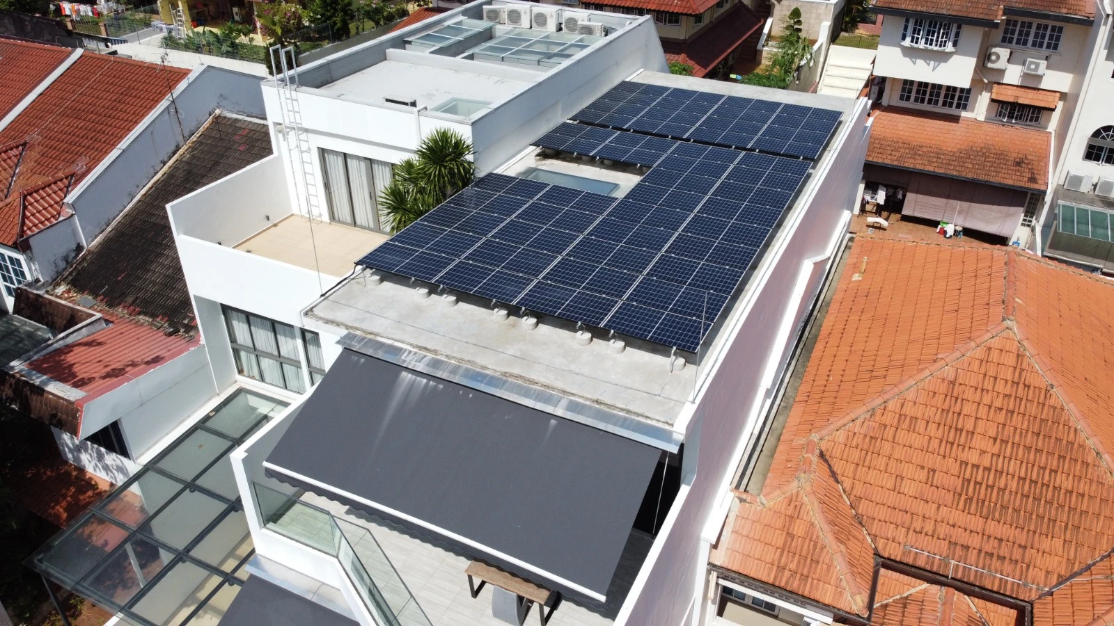 Rezeca Renewables 29.24 kWp solar panel installation on a flat RC roof at a contemporary home at Pemimpin Terrace, Bishan, Singapore