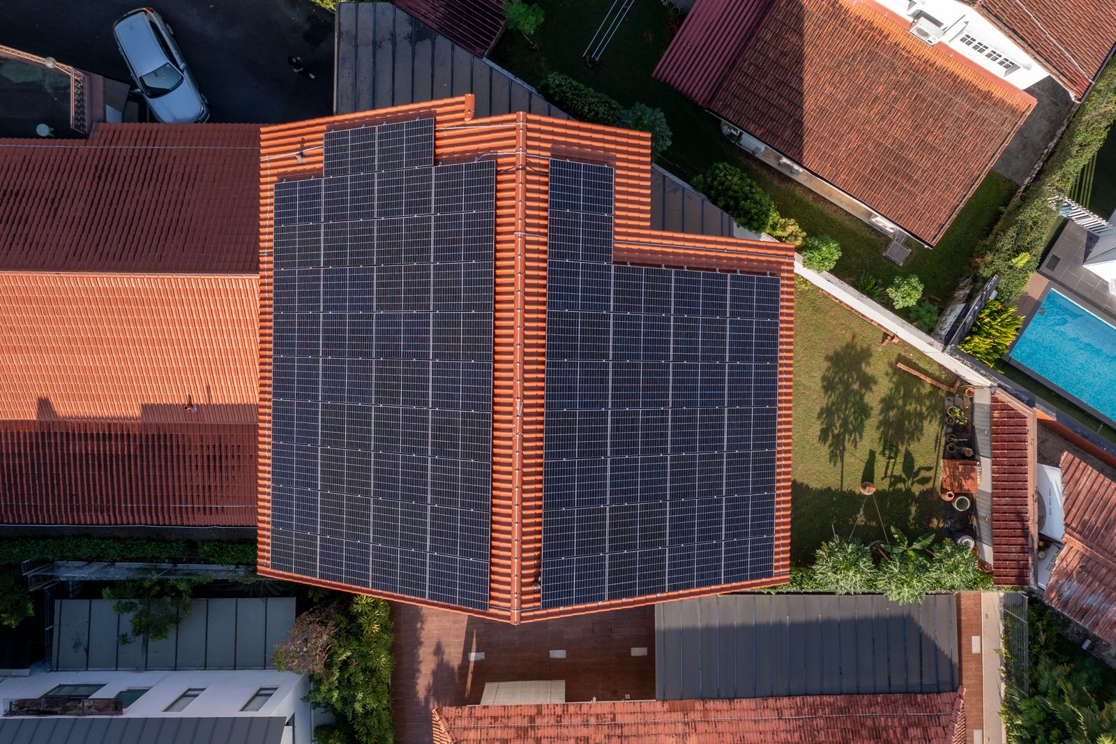 Aerial view of a Singapore landed home roof with solar panels, showing usable roof area and layout.