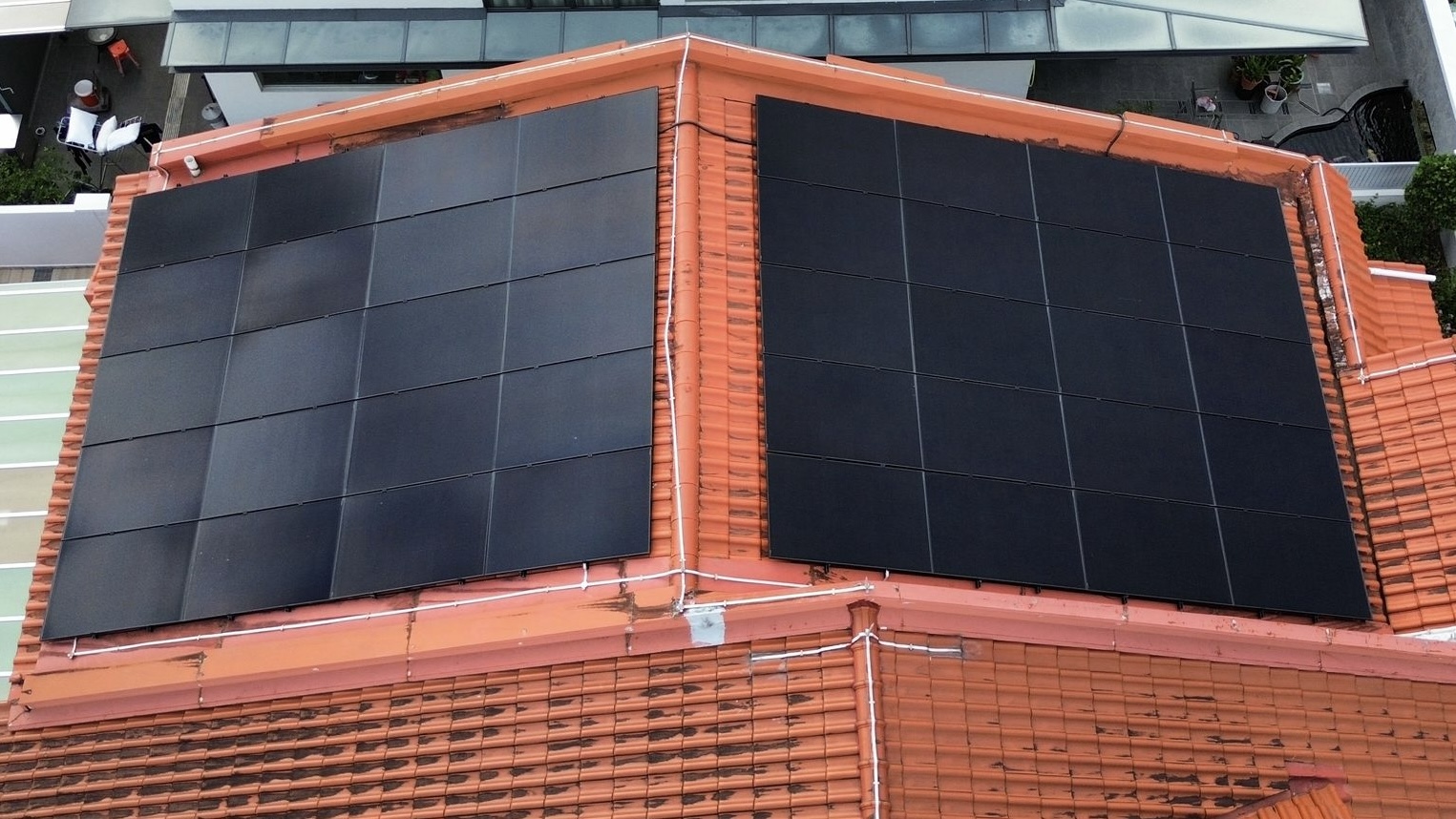 Rezeca Renewables 18.53 kWp solar panel installation on a tile roof at a landed home on Pemimpin Place, Bishan, Singapore
