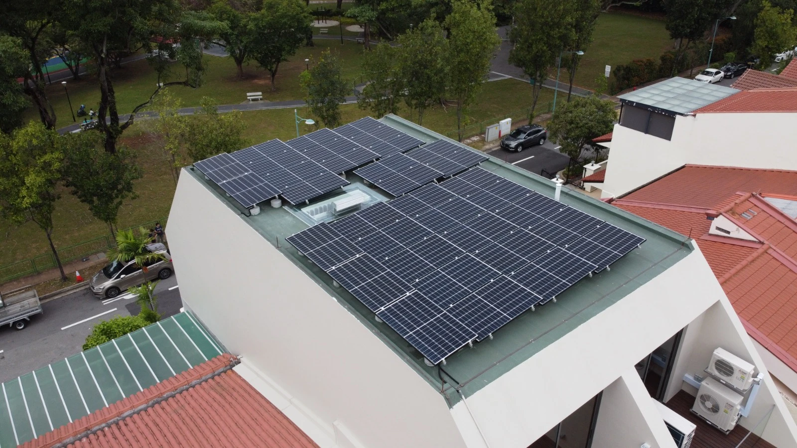 Rezeca Renewables 10.88 kWp solar panel installation on a flat RC roof at a landed home on West Coast Green, West Coast, Singapore