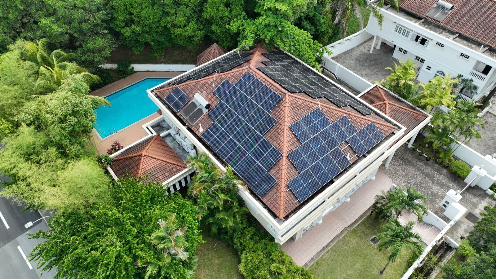Rezeca Renewables 40.05 kWp solar panel installation on a tile roof at a Good Class Bungalow on Leedon Park, Bukit Timah, Singapore