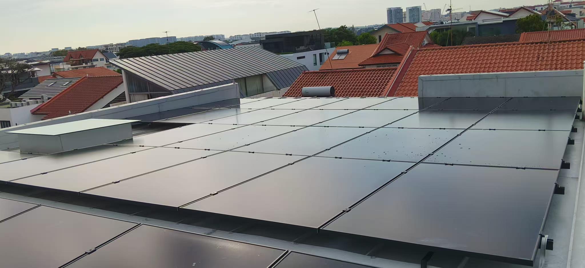Rooftop solar panels on a Singapore landed home, illustrating a grid-tied system that shuts off during a power outage unless a battery is fitted.