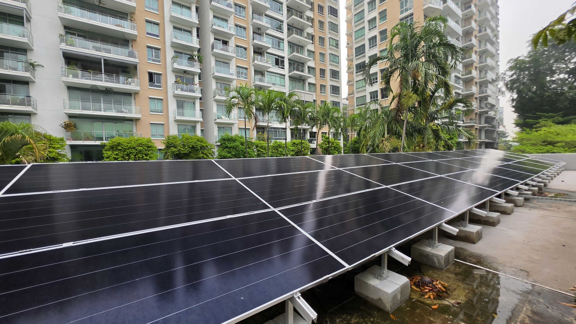 Rezeca Renewables 63.65 kWp condo solar installation on a flat concrete roof at Jalan Rumbia, River Valley, Singapore