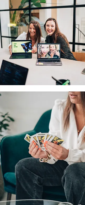 Two women smiling at a desk showing laptops, one with a virtual meeting screen and the other displaying a presentation slide, and a woman sitting on a green couch holding a fan of cards with colorful designs.