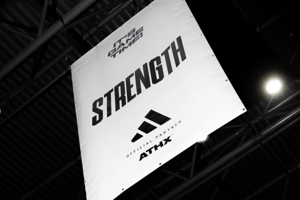 Adidas is embedded as official partner throughout the competition floor and infrastructure.
