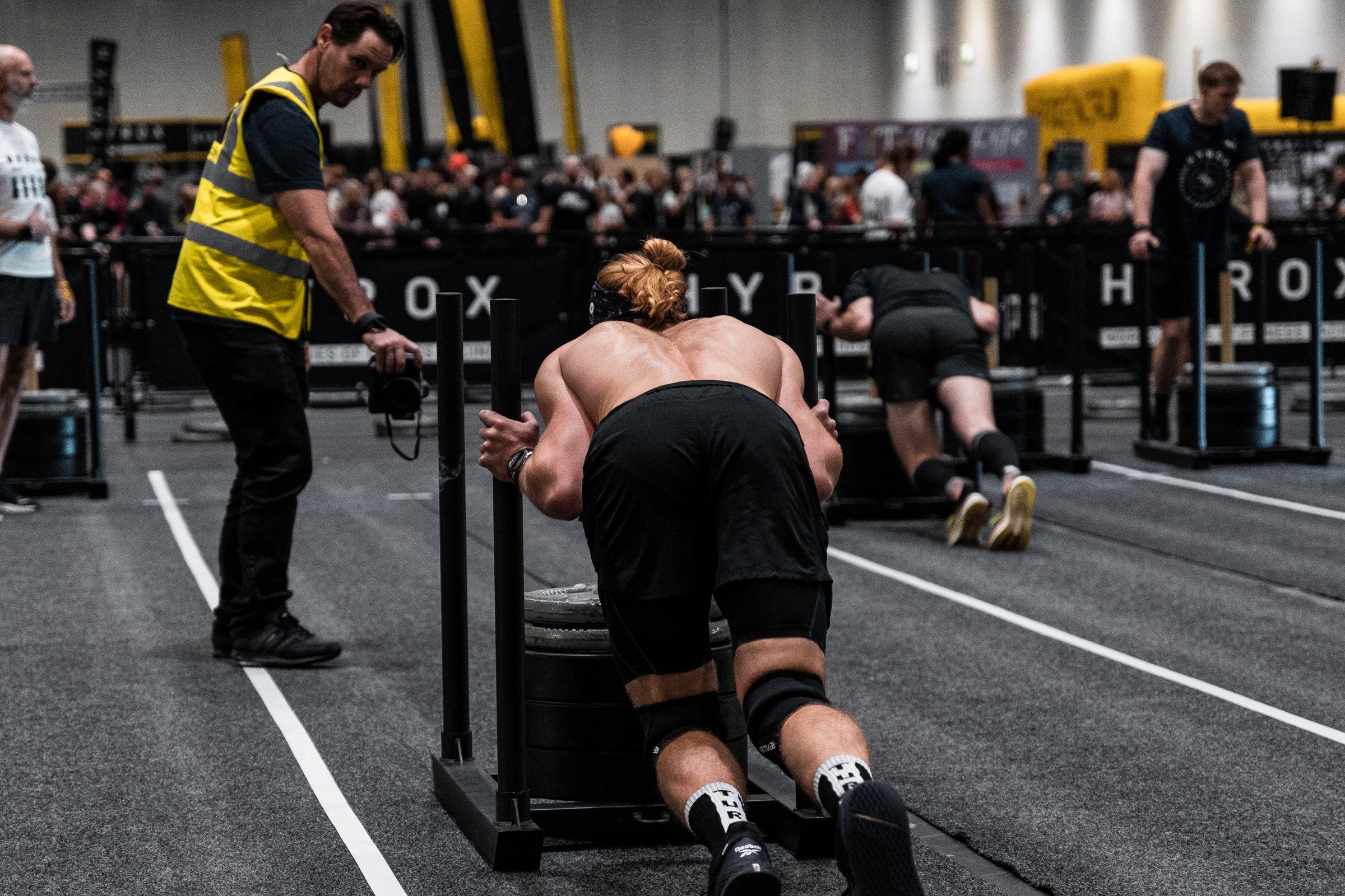 The sled push is the second station, pushed along marked lanes at ExCeL London.