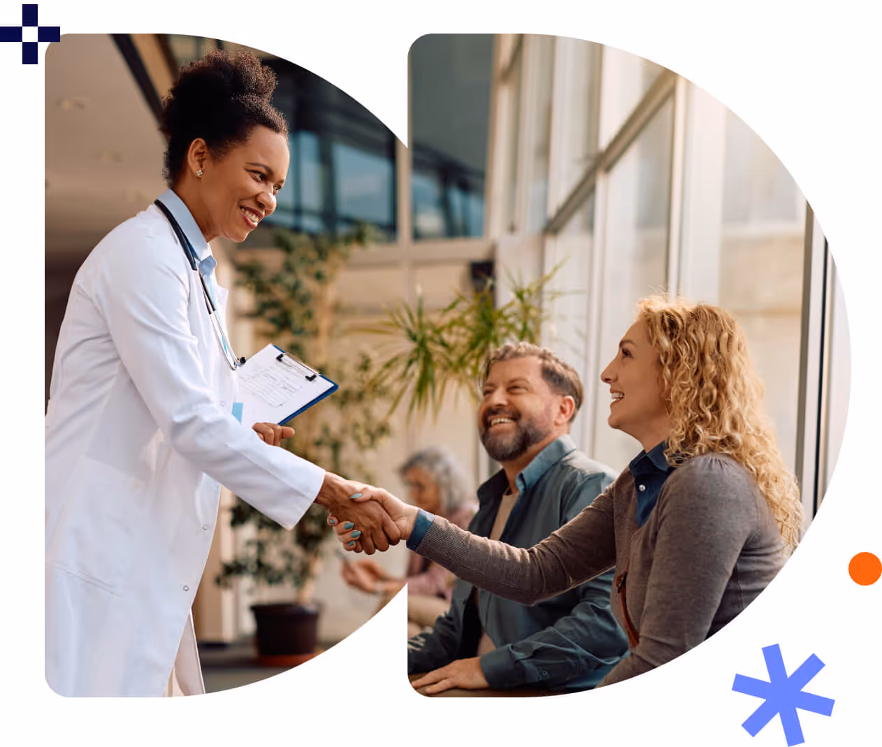 Female doctor smiling and shaking hands with a seated woman while a man watches and smiles.