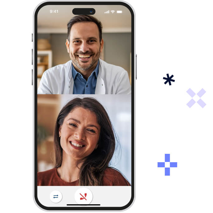 Smartphone screen showing a video call between a smiling male doctor and a smiling woman.
