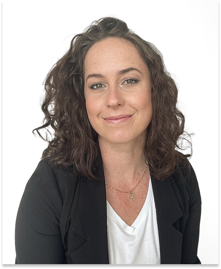 portraits of amanda gustin with a black blazer and white shirt with a white background