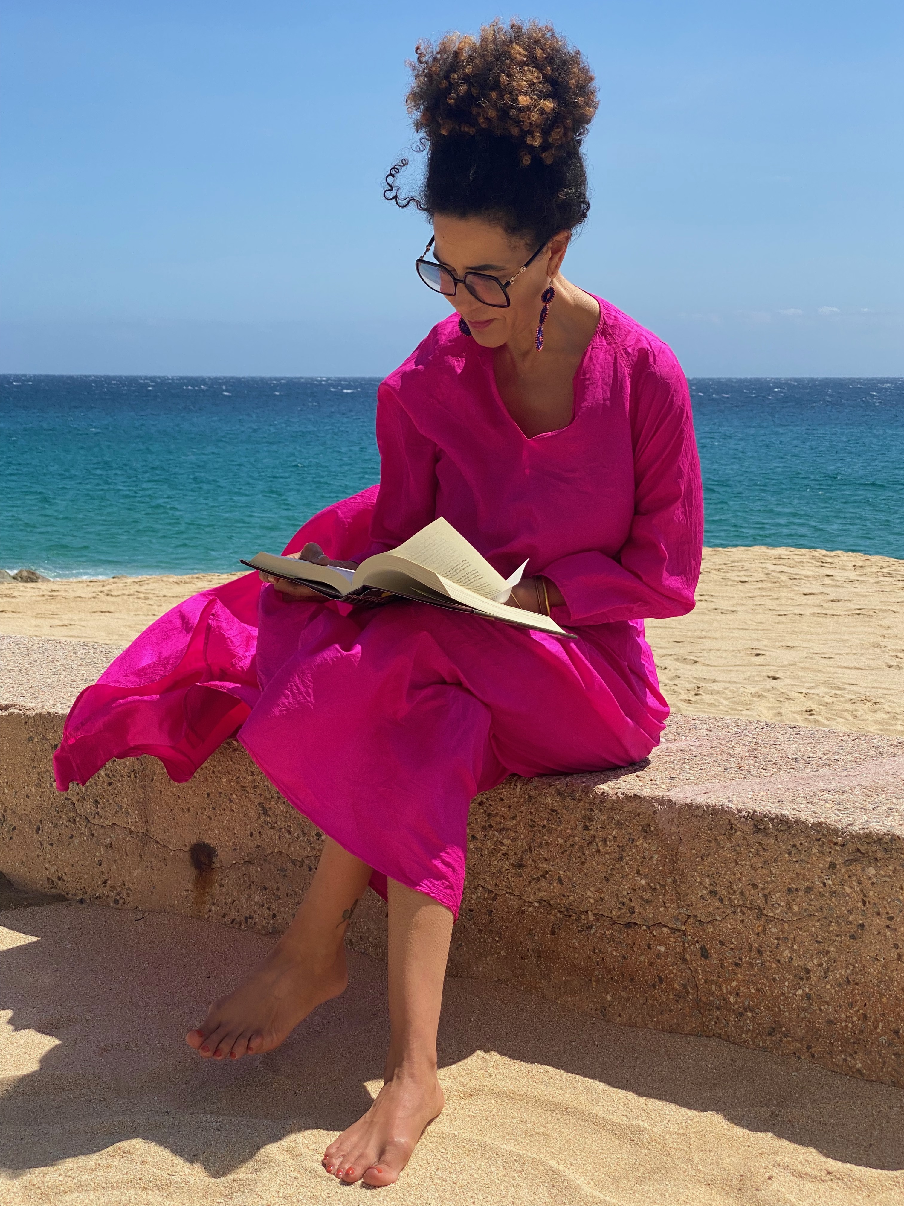 Kendra reading in the wind