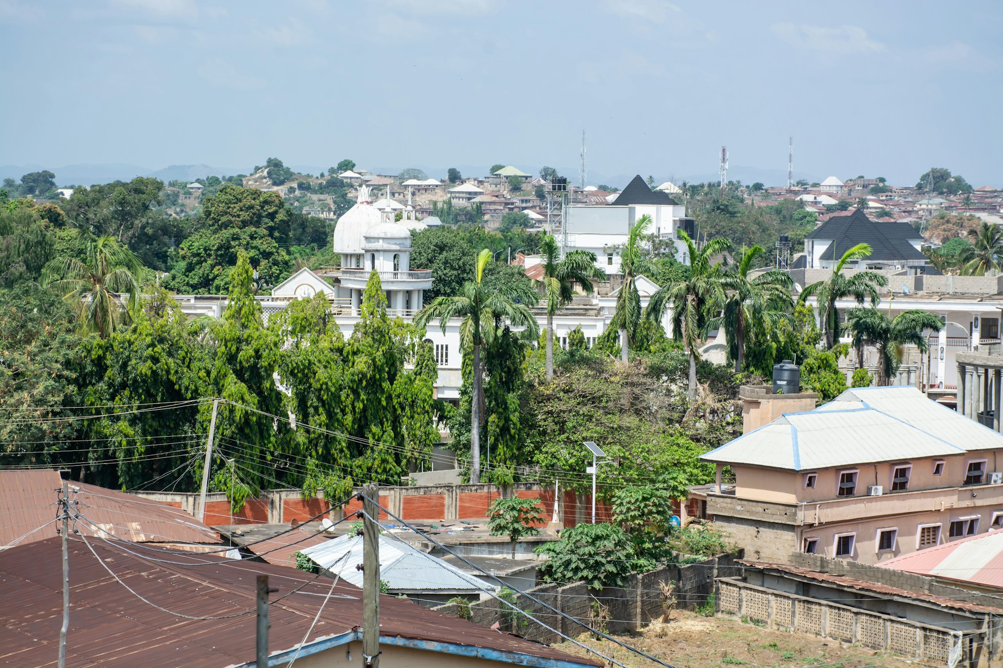 Aerial view of residential buildings and green landscape in Oyo State Nigeria representing real estate investment opportunities