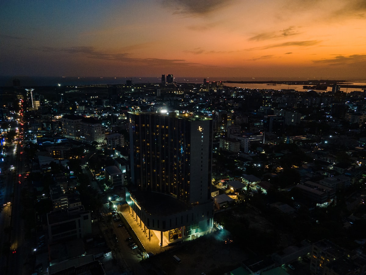 Nigerian city skyline at dusk representing real estate investment opportunities for millennials in Ibadan and Ogun State 2026