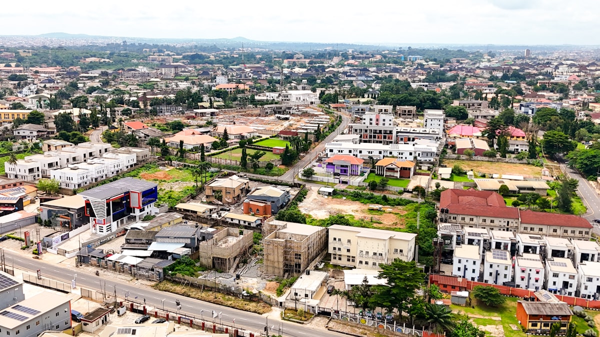 Aerial view of residential development in Nigeria showing houses and roads in a growing urban area