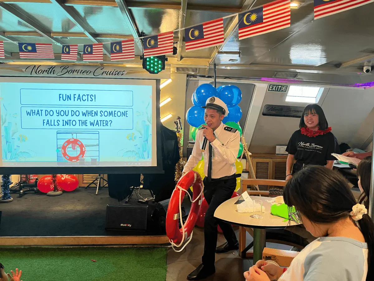 The ship's captain leading a sharing session with the children