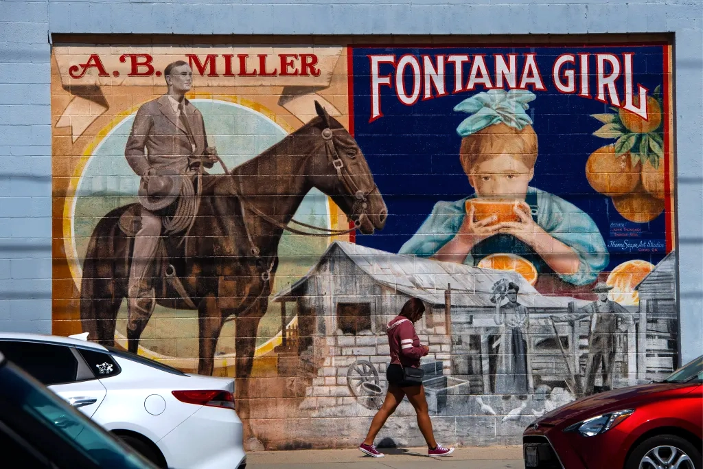 image of hands typing on a laptop with scientific data