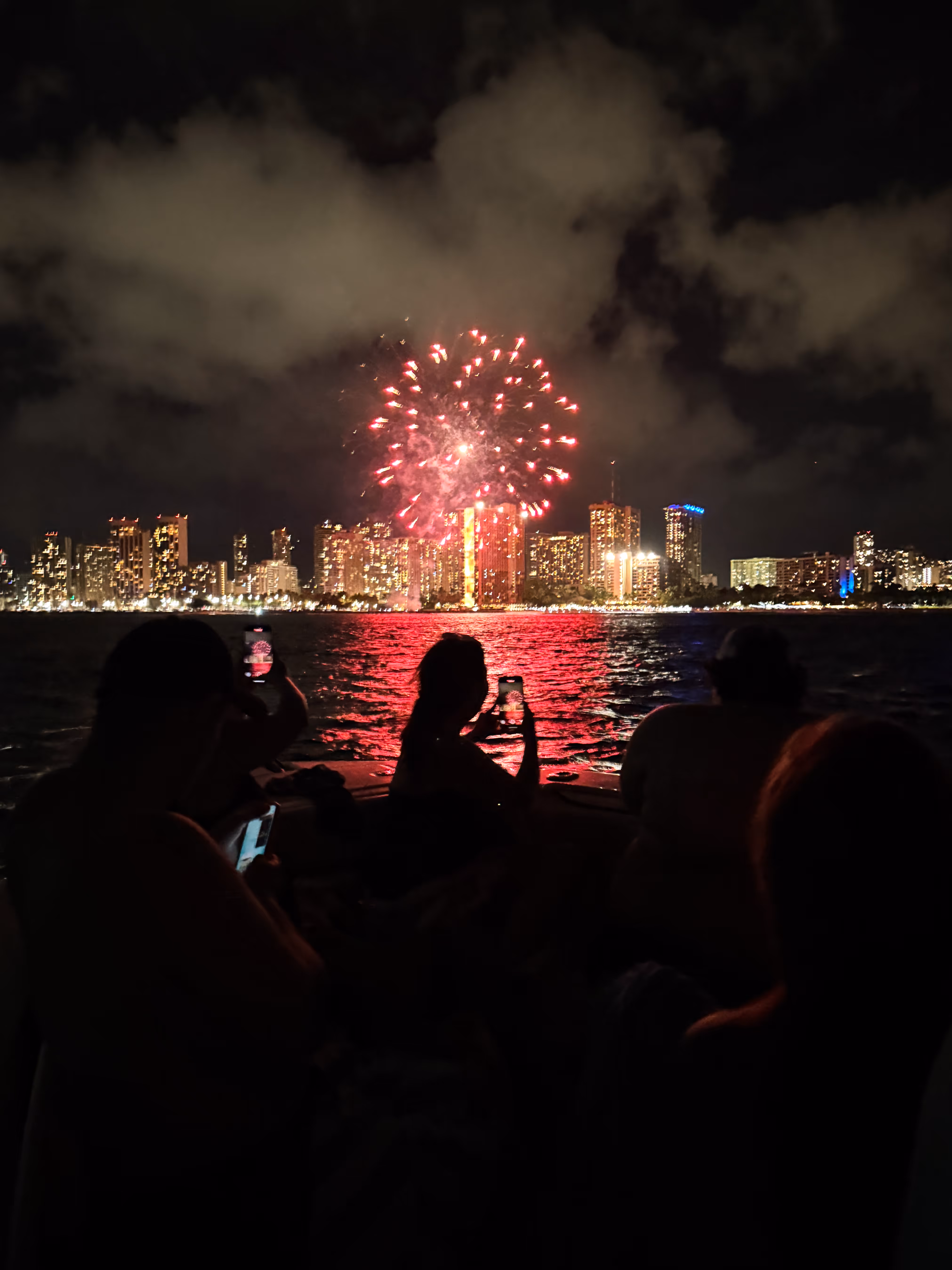 The Waikiki coastline at night, with a 