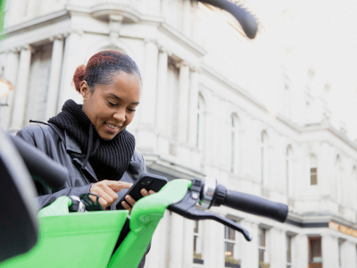 Woman using London lime bike