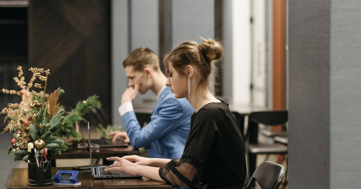 Two co-workers in office setting