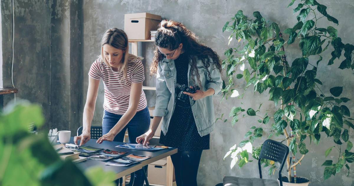 A product team reviewing qualitative feedback from concept testing during a design review.
